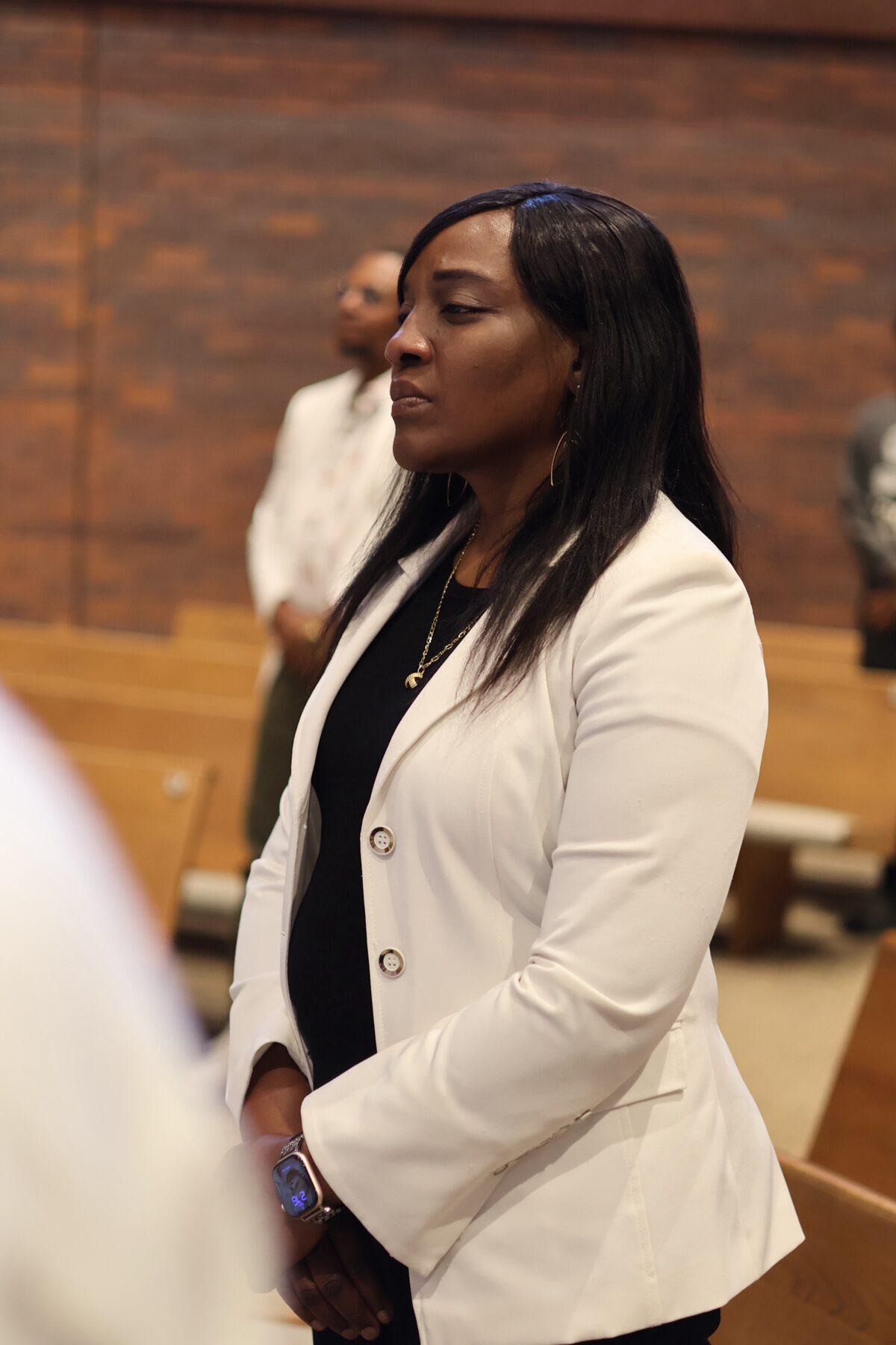 Church member listening during worship at Valley of Oaks Church