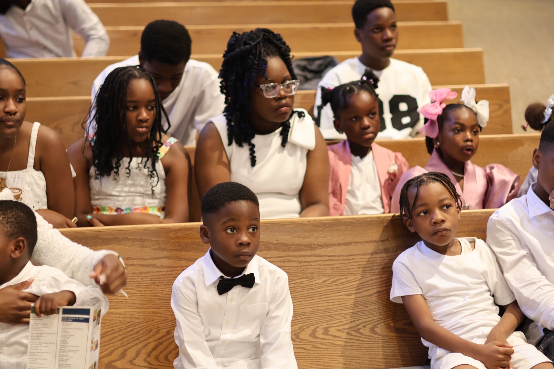 Children seated together in the Valley of Oaks Church congregation